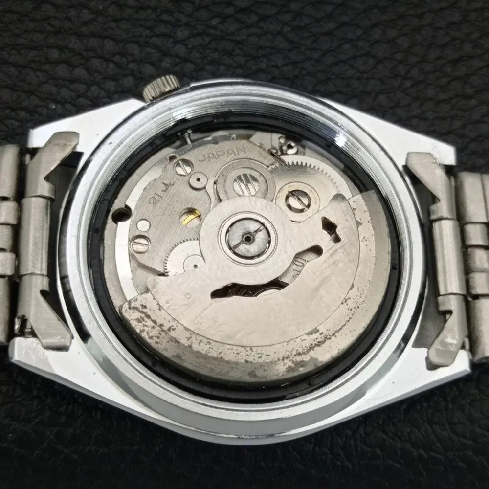 Vintage 1989 Seiko Automatic Mens Silver Watch W/daydate & White accents